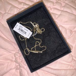 gold Kendra Scott necklace